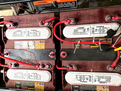  Electrical Connections and the Power of Sparks: Unpacking the Significance of a Car Battery's Wiring 