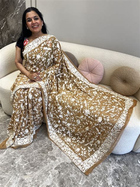 A Timeless Beauty and Cultural Reverence: Exploring the Charm of the Ivory Saree