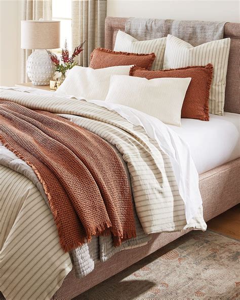 Add Layers of Pillows and Throws for an Inviting Look