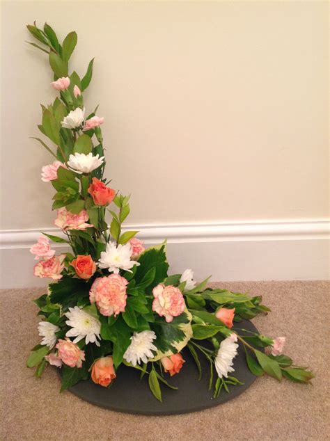 Creating a Harmonious Composition: Achieving Balance in Shape and Size of Floral Arrangements