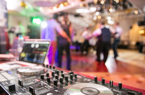 Dancing the Night Away: Choosing the Perfect Wedding Band or DJ