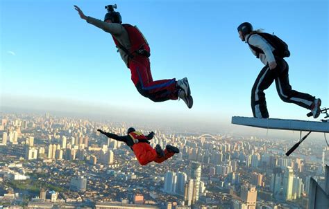 Daring Activities on Elevated Perches: From Captivating Rooftop Photography to Adrenaline-Pumping Base Jumping