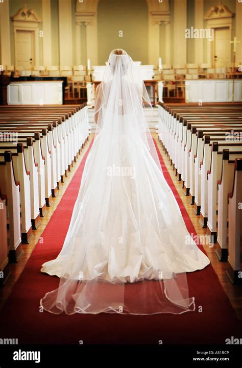 Dreaming of Walking Down the Aisle: The Meaning Behind the Ivory Bridal Gown