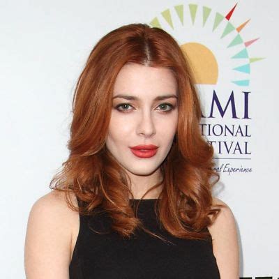 Elena Satine's net worth and assets