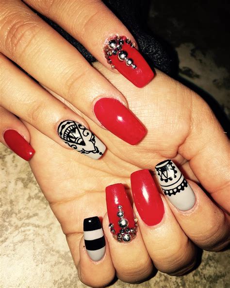 Exploring Creative Nail Art to Enhance Your Stylish Red Manicure