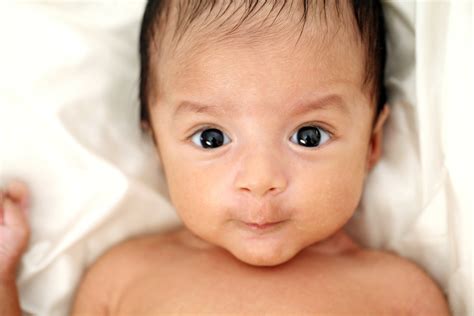 Exploring the Influence of Genetics on the Coloration of a Newborn's Eyes