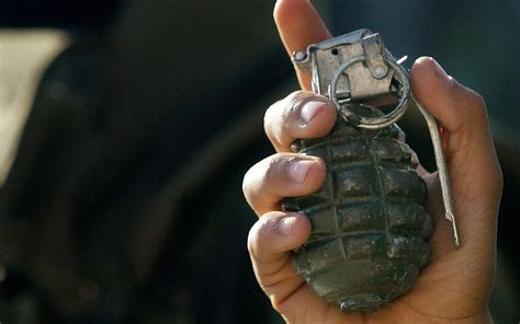 Exploring the Significance of Holding a Hand Grenade in Dreams