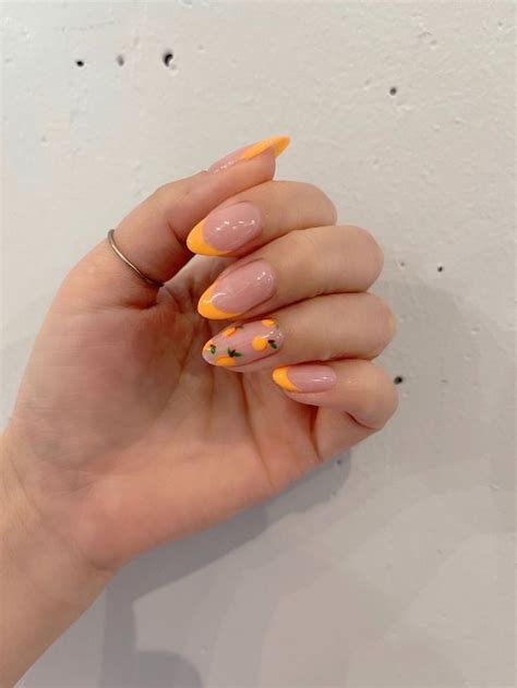 Expressing Creativity and Playfulness with Vibrant Tangerine Nail Art