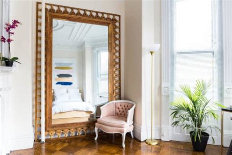 Incorporate Mirrors to Reflect Light and Expand the Room