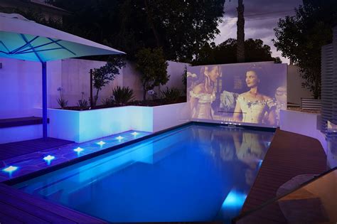 Incorporating Luxury Features: Pools, Home Theaters, and More