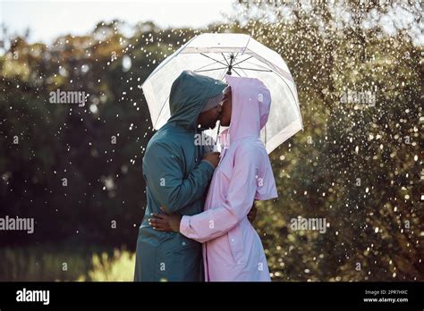 Intimacy in the Rain: Passionate Moments under an Umbrella