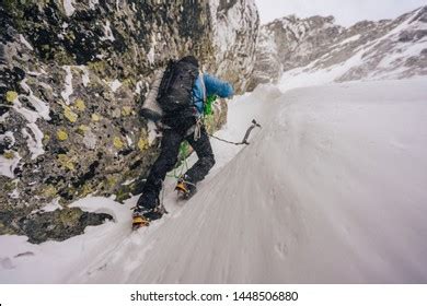 Overcoming the Elements: Facing Harsh Conditions in the Quest for Ascending the Majestic Snow Peak