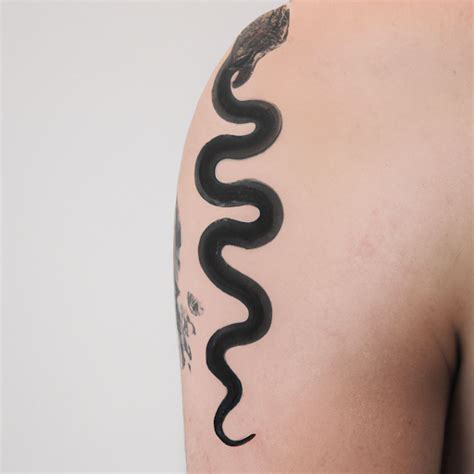 Snake Tattoos for Men: Strong Designs and Meaningful Representations