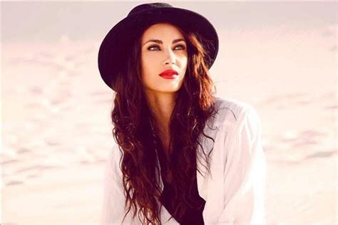 Tanit Phoenix: Early Life and Career