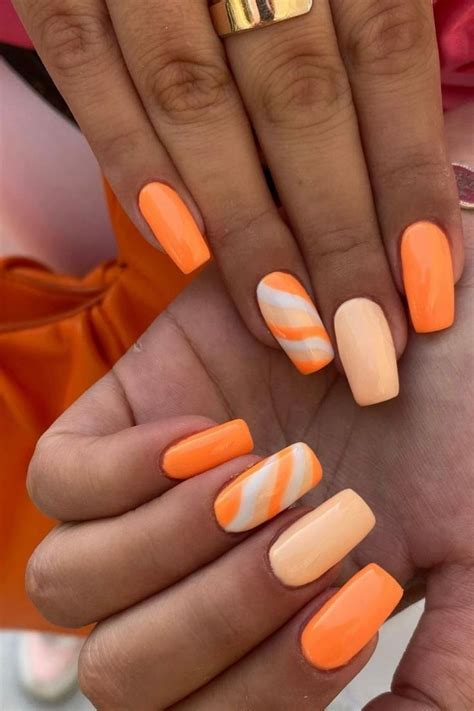 The Bold and Vibrant Appeal of Orange Nails