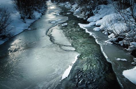 The Enigmatic Beauty of Frozen Waterways