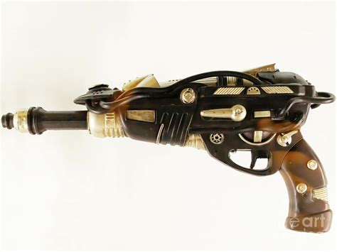 The Evolution of Science Fiction Weapons: From Ray Guns to Laser Guns