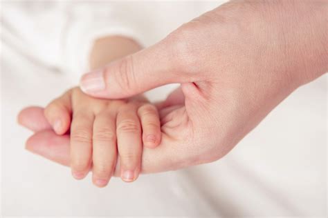 The Nurturing Impact of a Baby's Gentle Touch