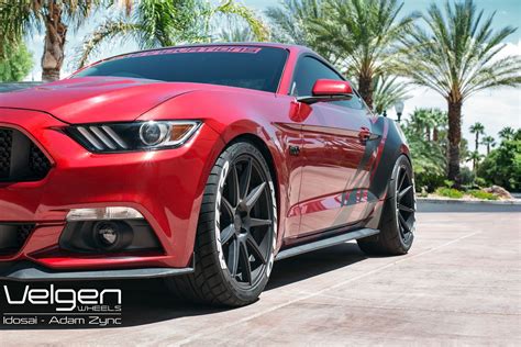 The Striking Flamboyance of a Ruby-Hued Mustang: An Expression of Individuality and Personal Style