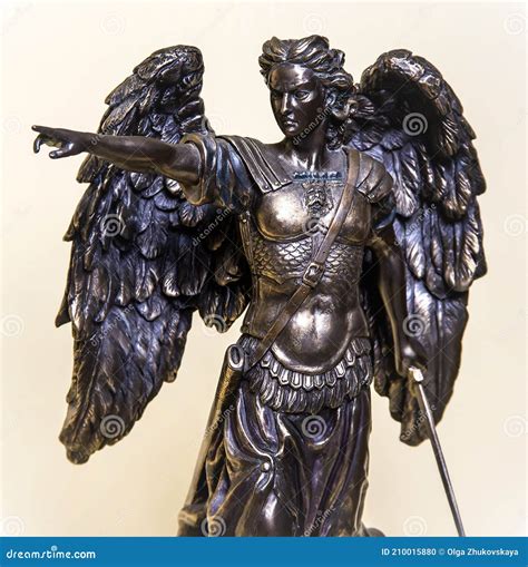 The Symbolic Image of Michael: Wings, Sword, and Scales