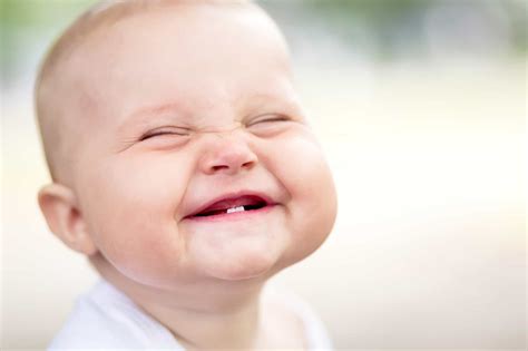 Unveiling the Power of a Infant's Grinning Face