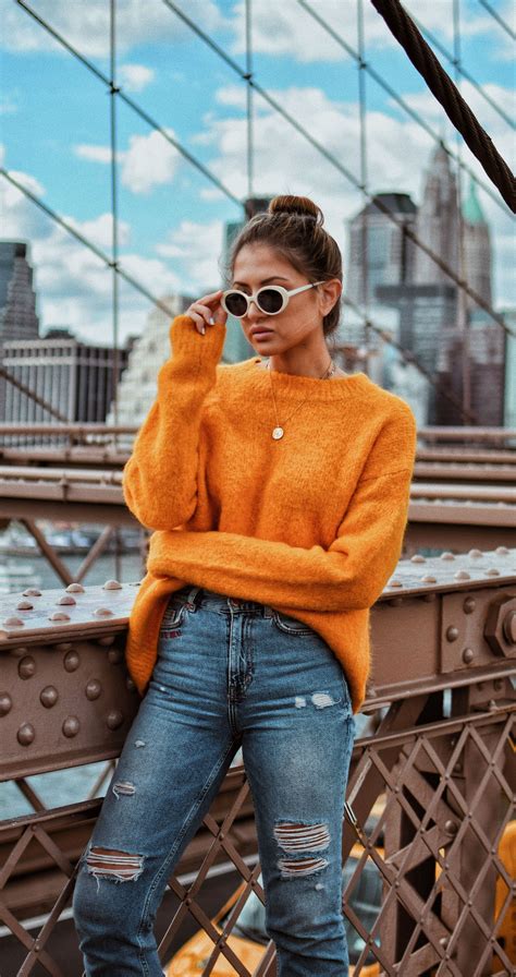 Versatile and Trendy: Pairing an Orange Sweater with Different Outfits