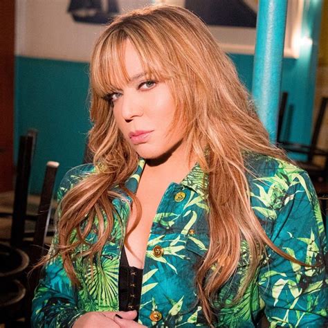 Who is Ednita Nazario?